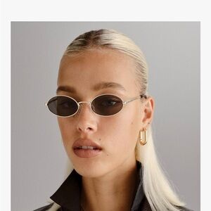 Le Specs Love Train Slim Oval Sunglasses in Gold $90 retail